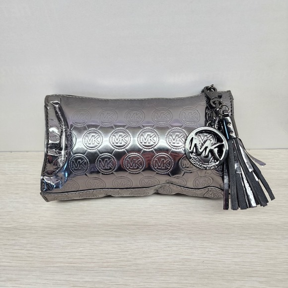 Michael Kors Handbags - Michael Kors Silver Metallic Makeup Bag With Detachable Charm Pull Key Chain